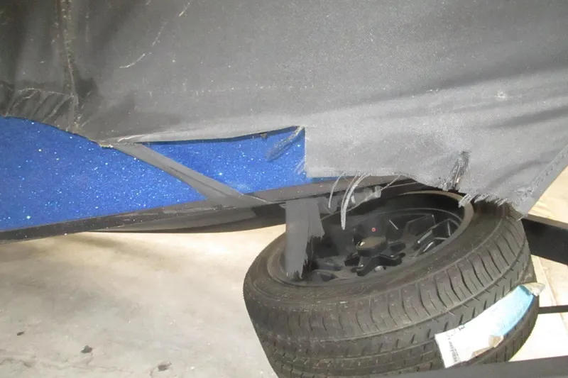 Slide: The Image of 2024 Nitro Z20 with torn cover revealing blue body and black wheel. - 8