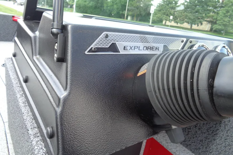 Slide: The Image of 2026 Lund 1800 Explorer Sport dashboard detail with textured finish and Explorer branding. - 14