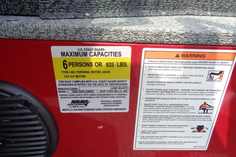 Slide: The Image of 2026 Lund 1800 Explorer Sport capacity and safety warning labels, highlighting maximum load and safety instructions. - 16