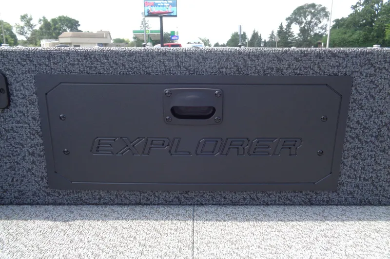 Slide: The Image of 2026 Lund 1800 Explorer Sport boat interior with "Explorer" embossed panel. - 20