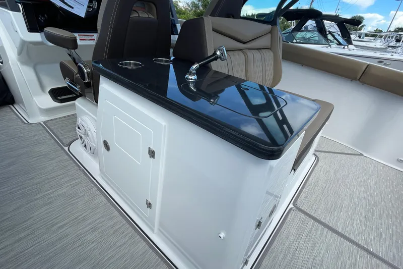 Slide: The Image of 2026 Monterey 30 ELITE boat interior with sleek seating and modern amenities. - 11