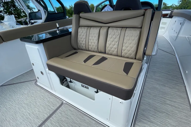Slide: The Image of Luxurious seating on 2026 Monterey 30 ELITE boat with integrated storage. - 12