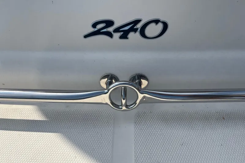 Slide: The Image of Close-up of 2001 Sea Ray 240 Sundancer boat detail with chrome railing. - 13