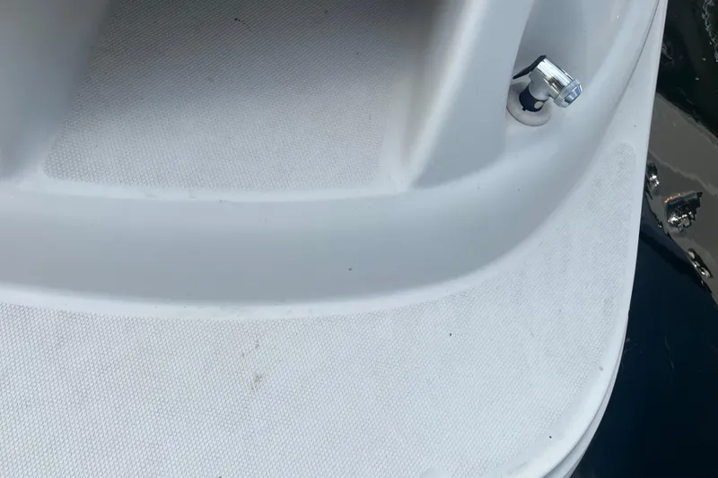 Slide: The Image of Close-up of 2001 Sea Ray 240 Sundancer boat deck with cleat. - 14