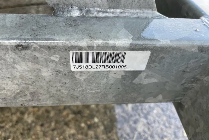 Slide: The Image of Barcode on metal surface of 2024 Mako Pro Skiff 19 CC boat. - 14