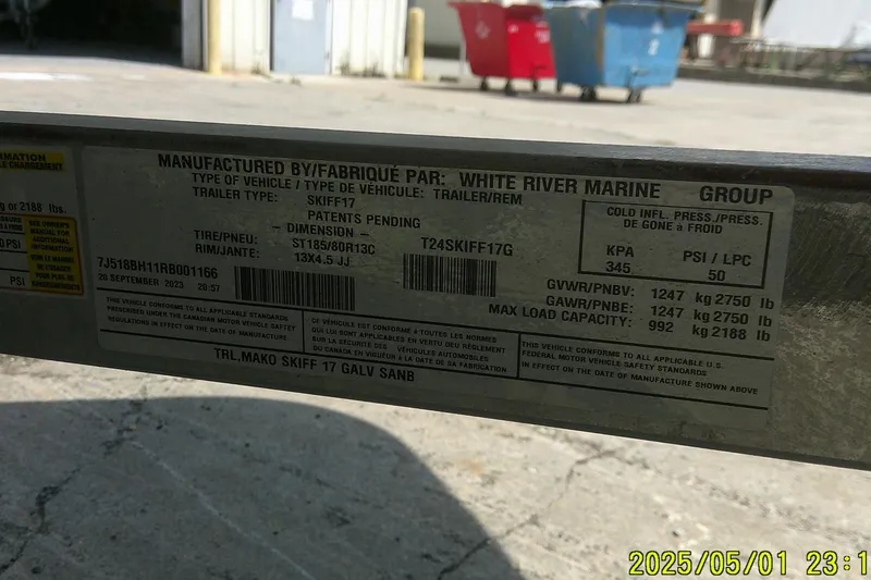 Slide: The Image of 2024 Mako Pro Skiff 17 CC trailer label, showing specifications and manufacturing details. - 9