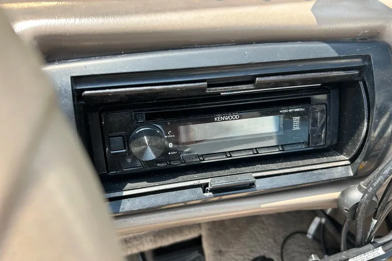 Slide: The Image of Kenwood stereo system in 2003 Crestliner 1850 Fish Hawk SC boat dashboard. - 35