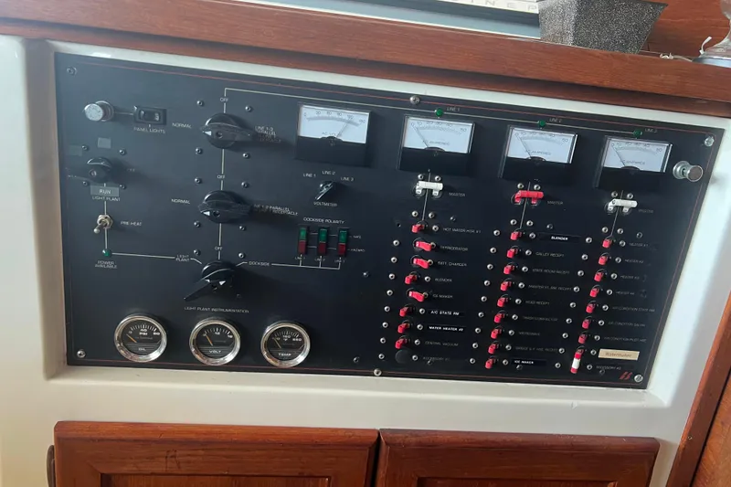 Slide: The Image of Control panel of a 1986 Bayliner 4550 Motoryacht with gauges and switches. - 37