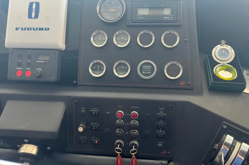 Slide: The Image of Control panel of 1986 Bayliner 4550 Motoryacht with gauges and navigation equipment. - 40