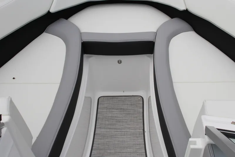 Slide: The Image of 2024 Cobalt 220S boat interior with sleek gray and white seating design. - 18