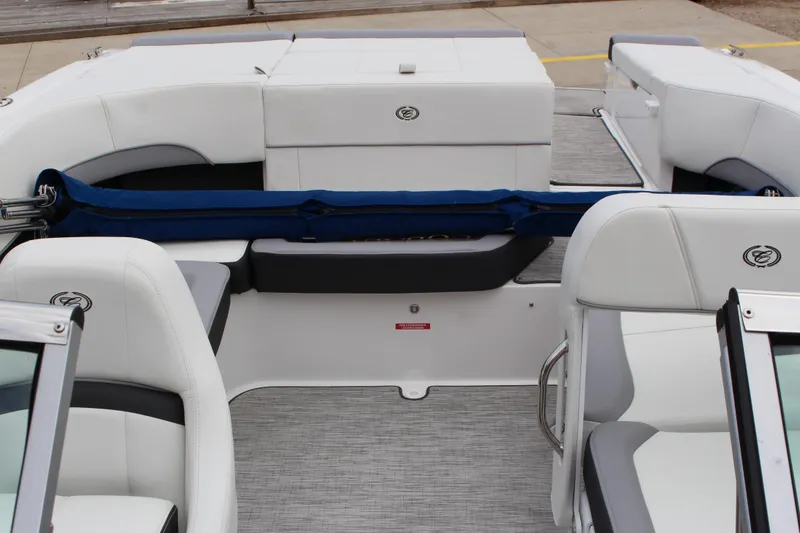 Slide: The Image of Interior of 2024 Cobalt 220S boat with white seating and modern design. - 22