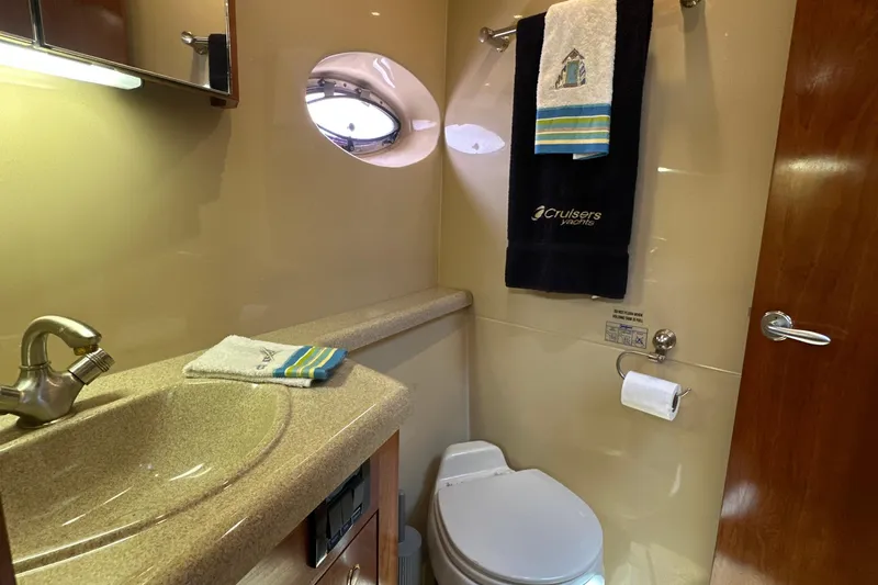 Slide: The Image of Luxurious bathroom in 2004 Cruisers Yachts 405 Express Motoryacht with elegant fixtures. - 77
