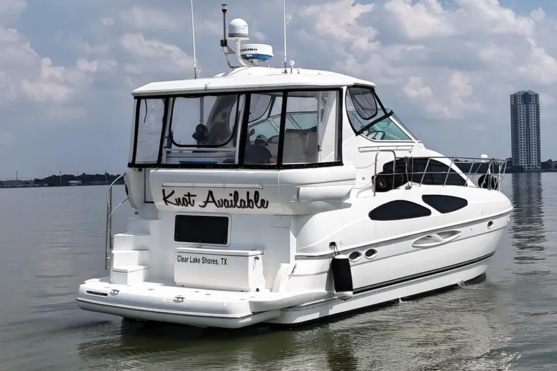 Slide: The Image of 2004 Cruisers Yachts 405 Express Motoryacht on calm water, Clear Lake Shores, TX. - 20