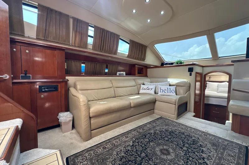 Slide: The Image of Luxurious interior of 2004 Cruisers Yachts 405 Express Motoryacht with leather seating and skylights. - 60