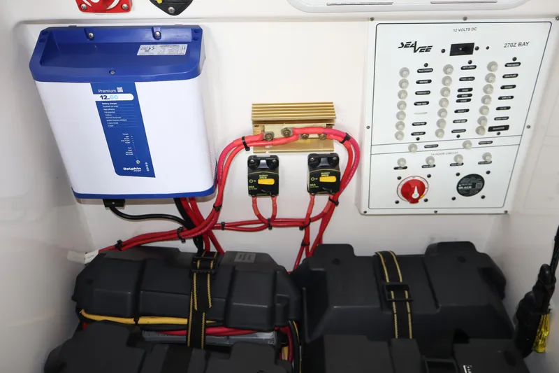 Slide: The Image of Electrical panel and battery setup in a 2019 SeaVee 270Z boat. - 8