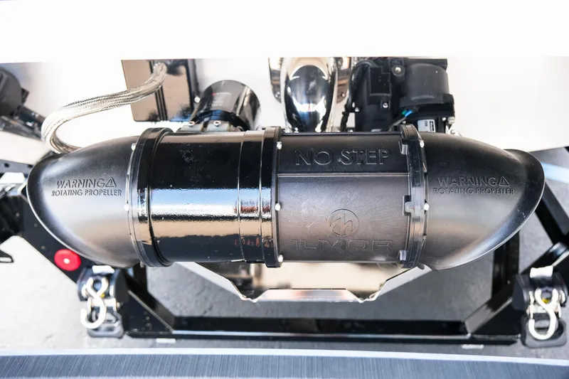 Slide: The Image of Close-up of 2026 MasterCraft XStar 25 boat's propeller guard with safety warnings. - 10