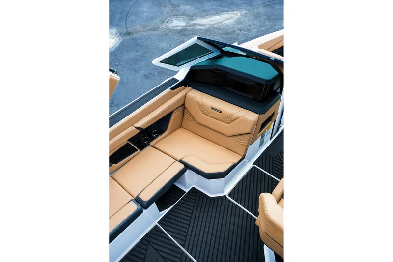 Slide: The Image of Luxurious interior of 2026 MasterCraft XStar 25 boat with tan leather seating. - 15