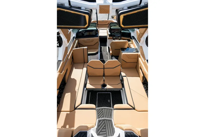 Slide: The Image of 2026 MasterCraft XStar 25 interior with luxurious tan seating and modern design. - 37