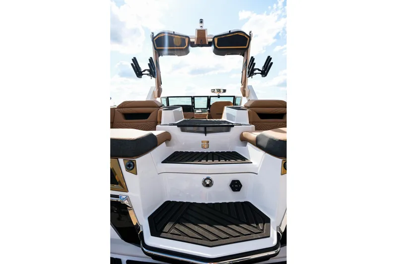 Slide: The Image of 2026 MasterCraft XStar 25 boat interior with luxurious seating and modern design. - 46