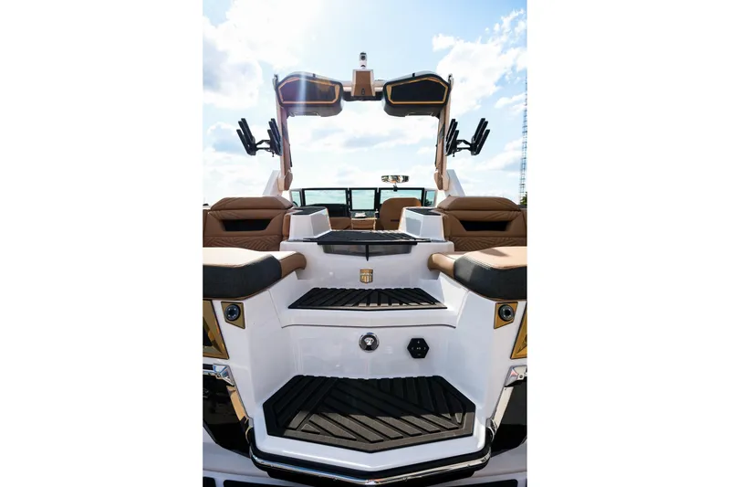 Slide: The Image of 2026 MasterCraft XStar 25 boat interior with luxurious seating and modern design. - 47