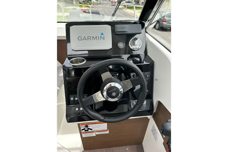 Slide: The Image of 2023 Jeanneau NC Weekender 695 Series 2 helm with Garmin navigation system. - 20