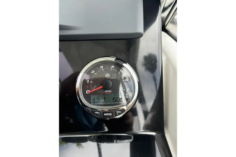 Slide: The Image of Tachometer of 2023 Jeanneau NC Weekender 695 Series 2 displaying RPM and voltage. - 21
