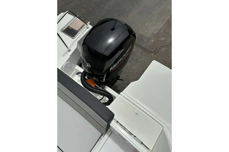 Slide: The Image of 2023 Jeanneau NC Weekender 695 Series 2 with Mercury outboard engine. - 6