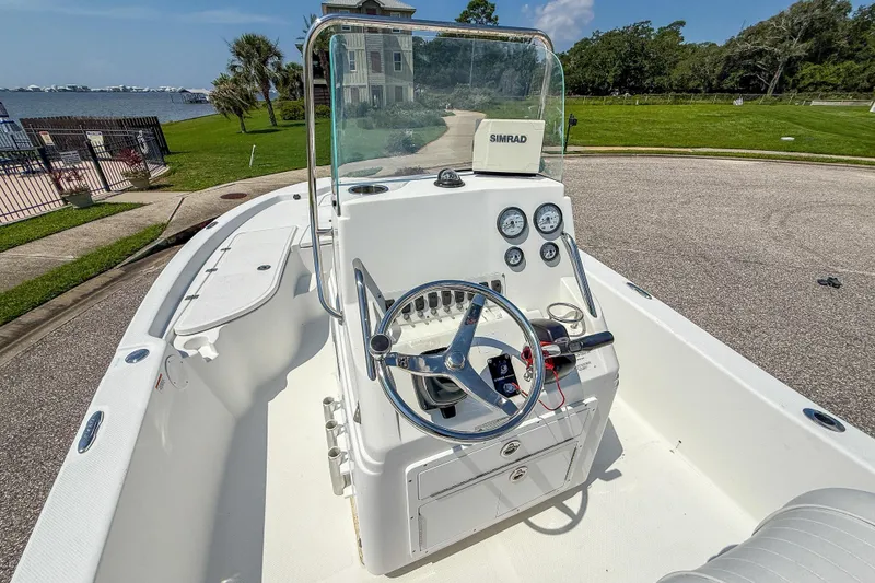Slide: The Image of 2013 Sea Fox 200XT boat interior with steering wheel and control panel. - 17