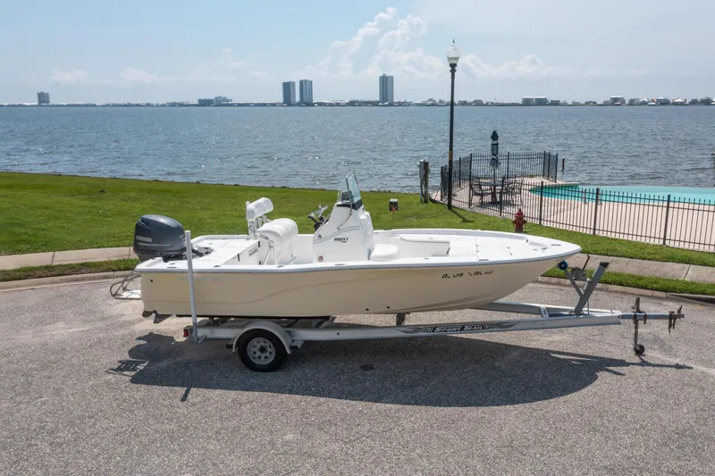 Slide: The Image of 2013 Sea Fox 200XT boat on trailer by waterfront, sunny day. - 7