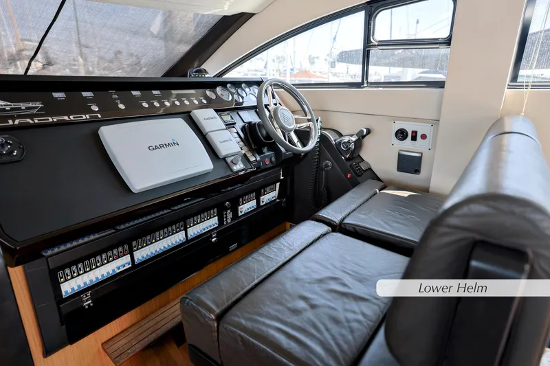 Slide: The Image of Galley kitchen in 2013 Fairline Squadron 42 yacht with modern appliances and wood cabinetry. - 18