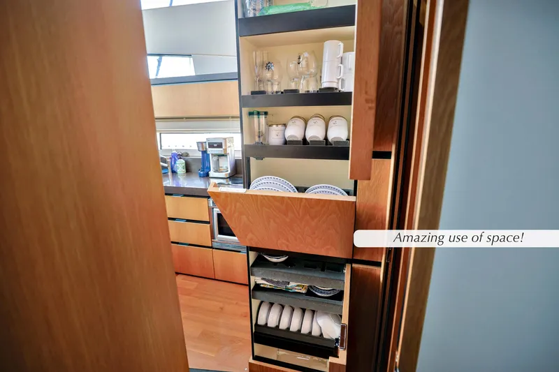 Slide: The Image of Owner's cabin in 2013 Fairline Squadron 42 yacht with blue bedding and wooden accents. - 23