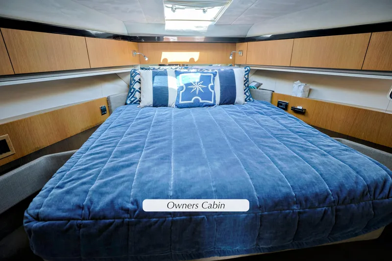 Slide: The Image of Luxurious cabin interior of 2013 Fairline Squadron 42 yacht with blue bedding. - 24