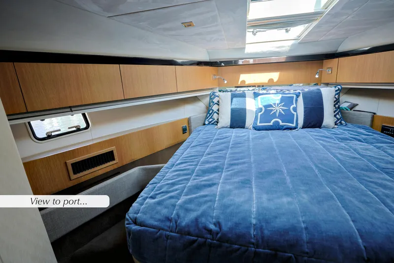 Slide: The Image of Luxurious cabin interior of 2013 Fairline Squadron 42 yacht with blue bedding. - 25