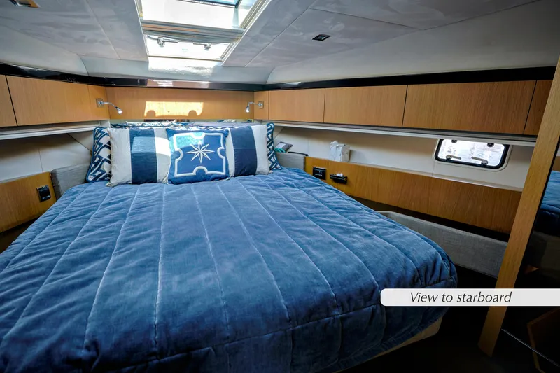 Slide: The Image of Owner's en-suite bathroom in 2013 Fairline Squadron 42 yacht, featuring modern fixtures and shower. - 26