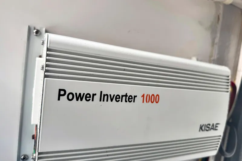 Slide: The Image of Achilles dinghy with Yamaha 8hp motor docked beside Fairline Squadron 42, 2013 model. - 33