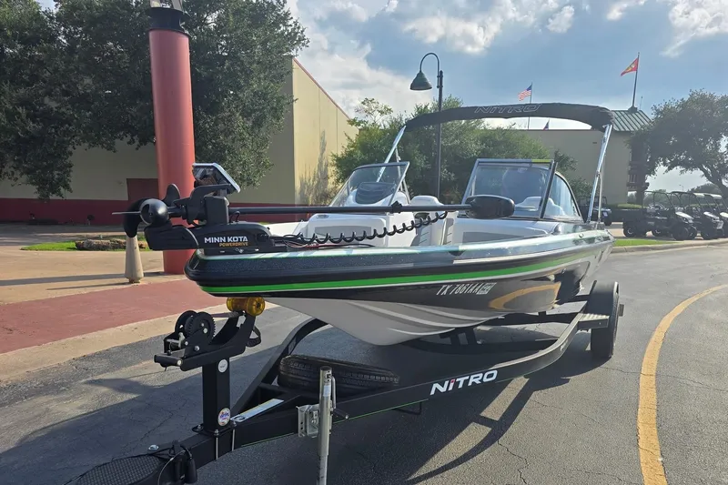 Slide: The Image of 2020 Nitro Z19 Sport boat on trailer, equipped with Minn Kota trolling motor. - 1