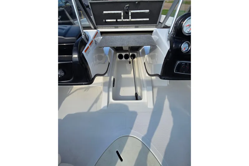 Slide: The Image of 2020 Nitro Z19 Sport boat interior with dashboard and controls. - 13