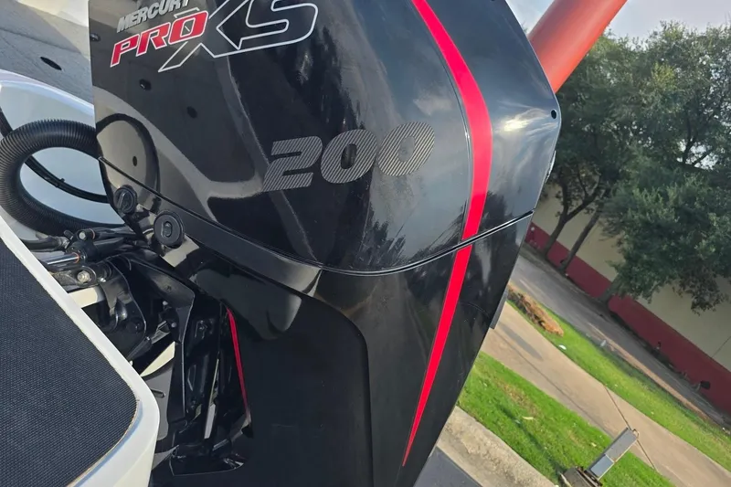 Slide: The Image of Mercury Pro XS 200 engine on 2020 Nitro Z19 Sport boat, outdoor setting. - 4