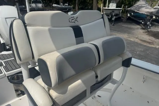 Slide: The Image of 2018 Crevalle 26 HBW boat seat with cushioned backrest and armrests. - 14