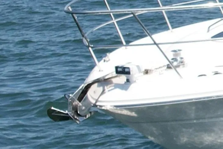 Slide: The Image of 2007 Sea Ray 52 Sedan Bridge yacht bow with anchor on water. - 10