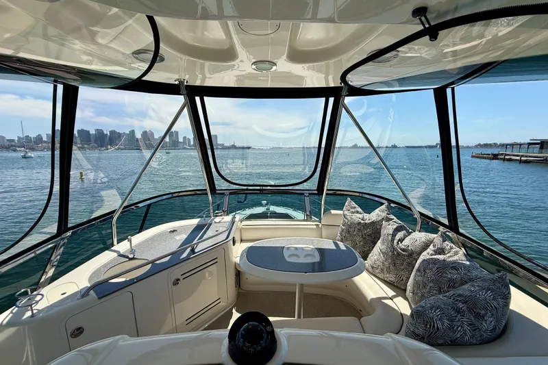 Slide: The Image of Interior view of 2007 Sea Ray 52 Sedan Bridge yacht with city skyline. - 15