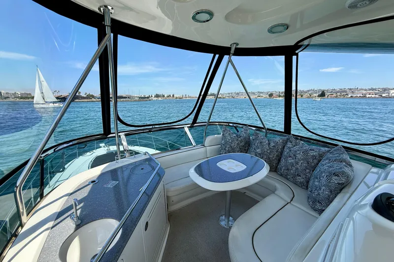 Slide: The Image of Luxurious 2007 Sea Ray 52 Sedan Bridge interior with ocean view and comfortable seating. - 27