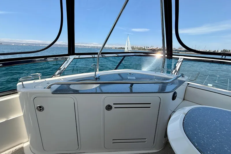 Slide: The Image of 2007 Sea Ray 52 Sedan Bridge yacht interior with ocean view and sleek design. - 28