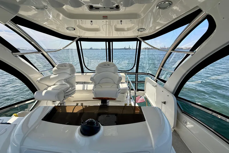Slide: The Image of Luxurious 2007 Sea Ray 52 Sedan Bridge interior with panoramic ocean view. - 31