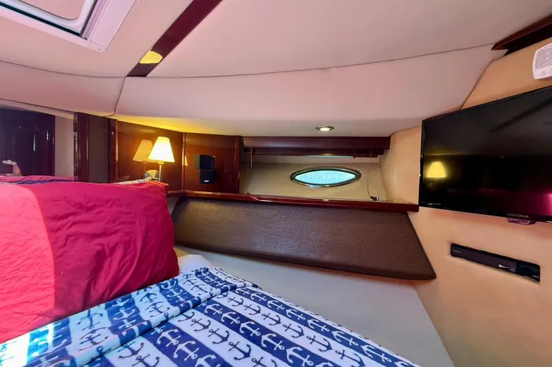 Slide: The Image of Luxurious 2007 Sea Ray 52 Sedan Bridge cabin with cozy bedding and modern amenities. - 48