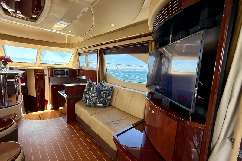Slide: The Image of Luxurious interior of 2007 Sea Ray 52 Sedan Bridge yacht with modern amenities and ocean view. - 64
