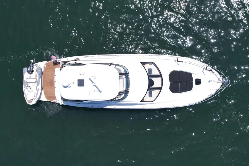 Slide: The Image of Aerial view of 2007 Sea Ray 52 Sedan Bridge yacht on sparkling water. - 8