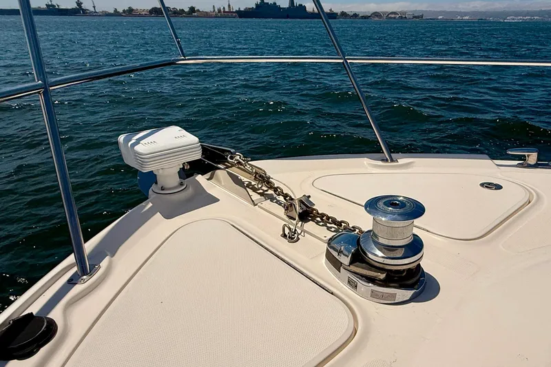 Slide: The Image of Bow of 2007 Sea Ray 52 Sedan Bridge yacht with anchor chain and winch. - 83