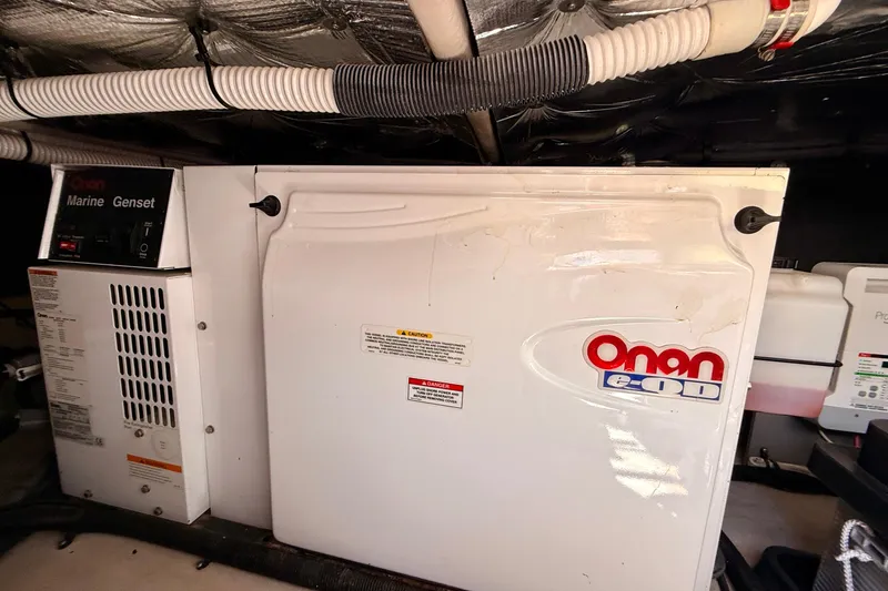 Slide: The Image of Onan marine generator in 2007 Sea Ray 52 Sedan Bridge engine room. - 87