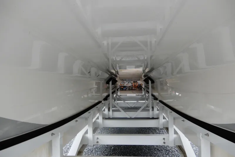 Slide: The Image of Underneath view of a 2008 Nor-Tech 3600 Supercat boat hull on a trailer. - 18